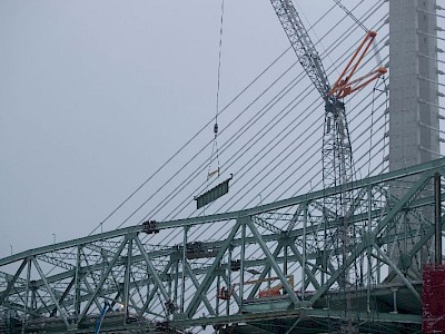 The last section of the bridge disappears