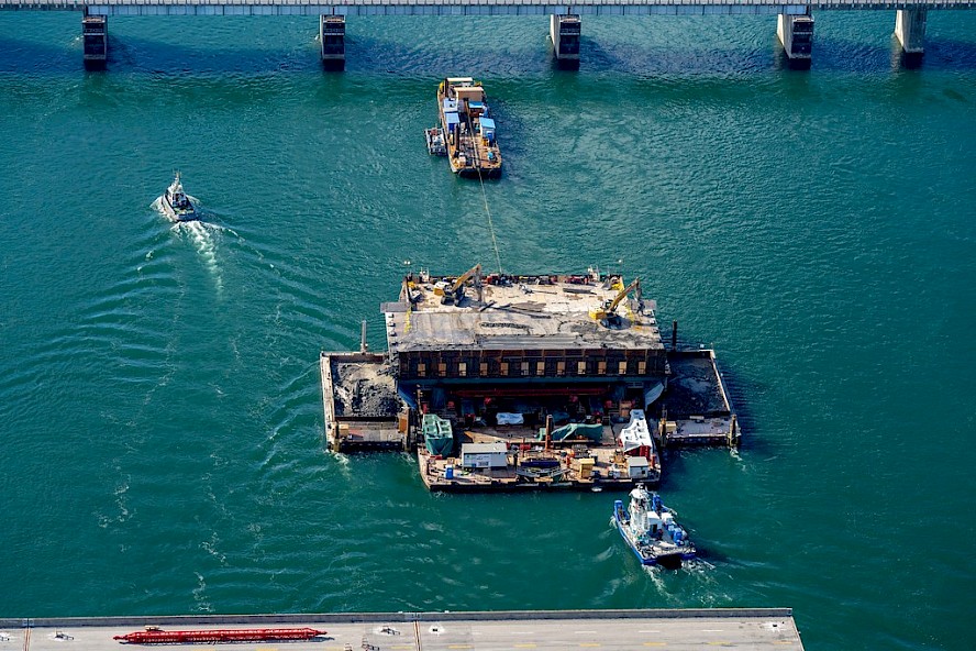 A span being transported on the river