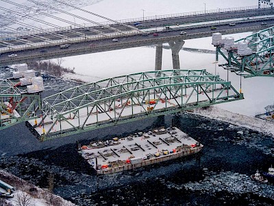 Operation of lowering the main span